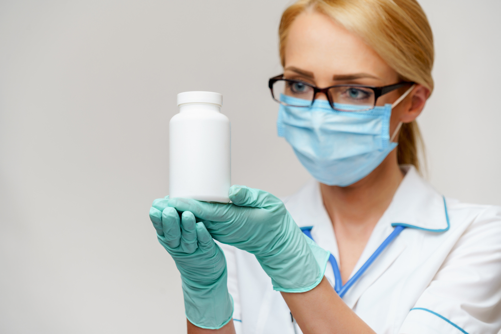 Custom pharmacy labels with pharmacy name and logo on prescription bottle
